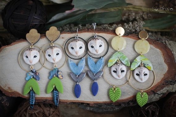 Light owl earrings bold statement