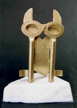 metal owl and key sculpture