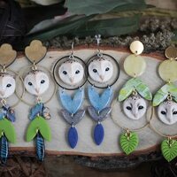 Light owl earrings bold statement