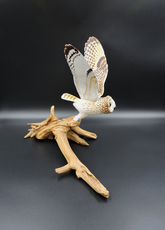 Short-eared owl, a wooden sculpture of an owl.