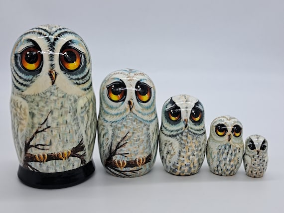 Snowy White owls nesting dolls Matryoshka