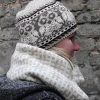 Knitted Nordic winter hat with owls