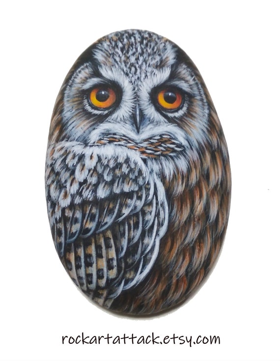 Eurasian eagle owl hand painted on sea pebble