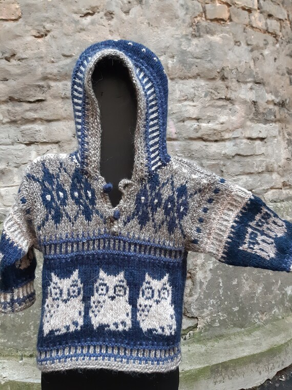 Kids knitted winter sweater with owls